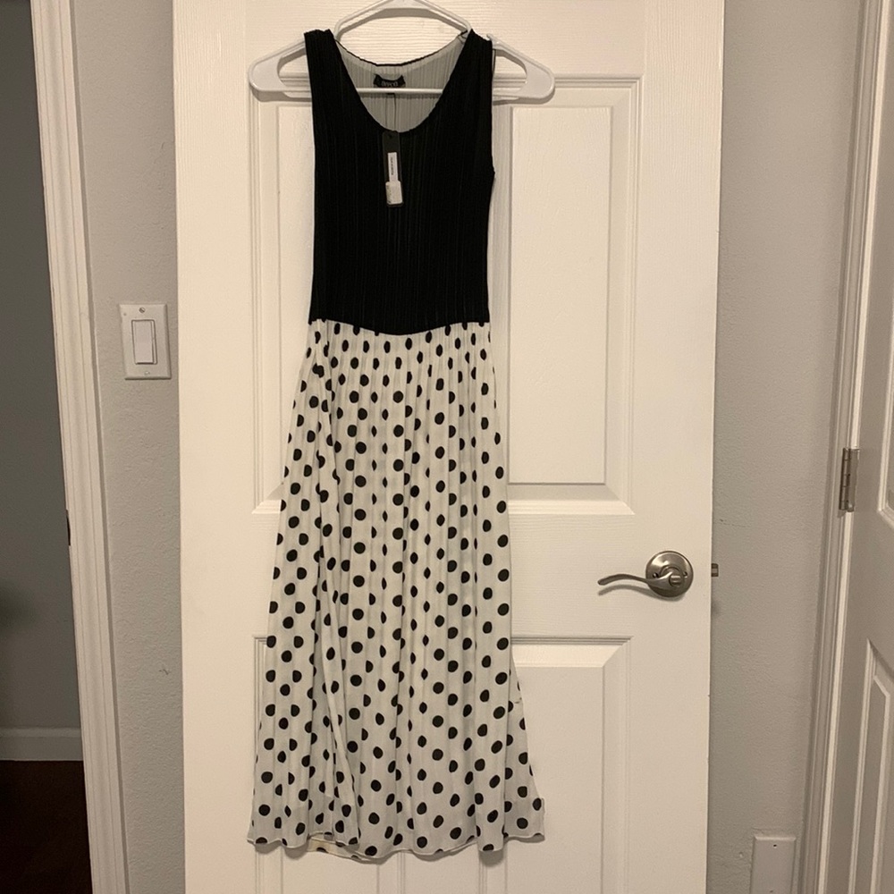This is a beautiful VEECA black and white black polkadot DRESS